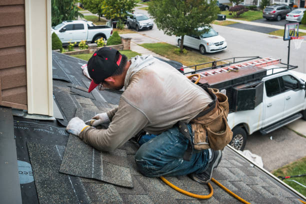 Professional Roofing technician working in Bridgeport, WA